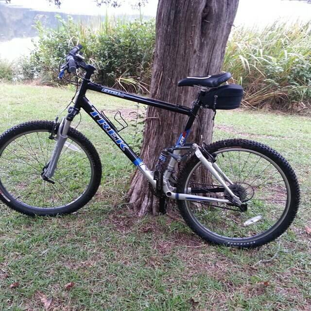 Mountain biking by a lake