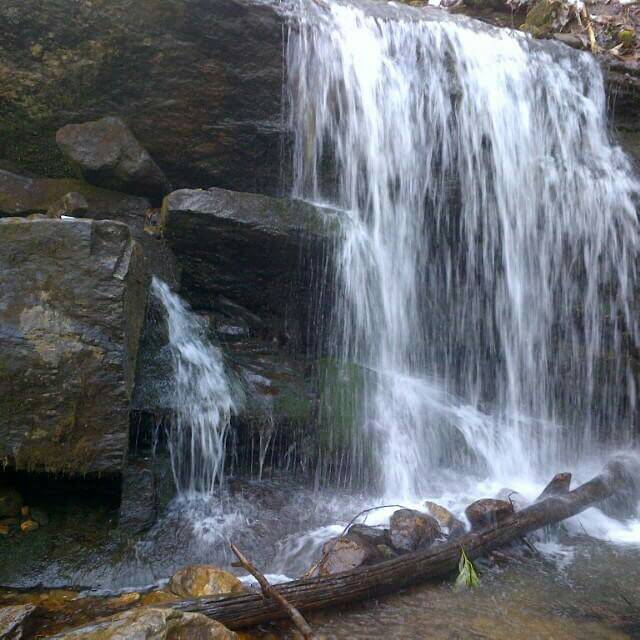 DIscovering waterfalls while hiking in the mountains